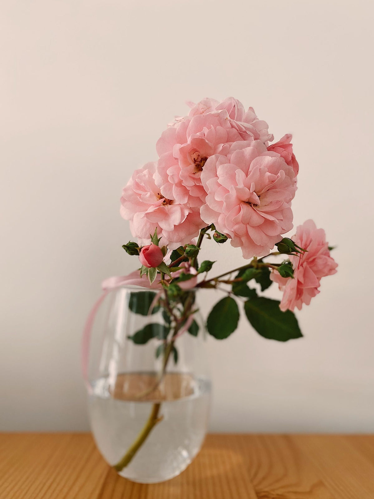 Garden roses arranged in a glass vase