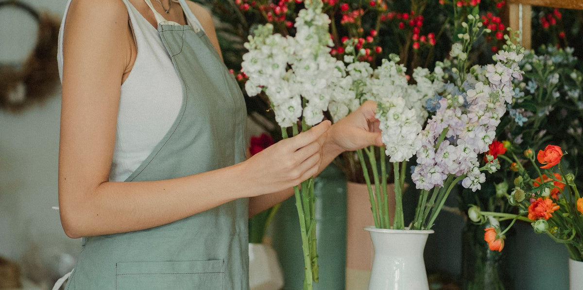 A florist selecting stems for an arrangement