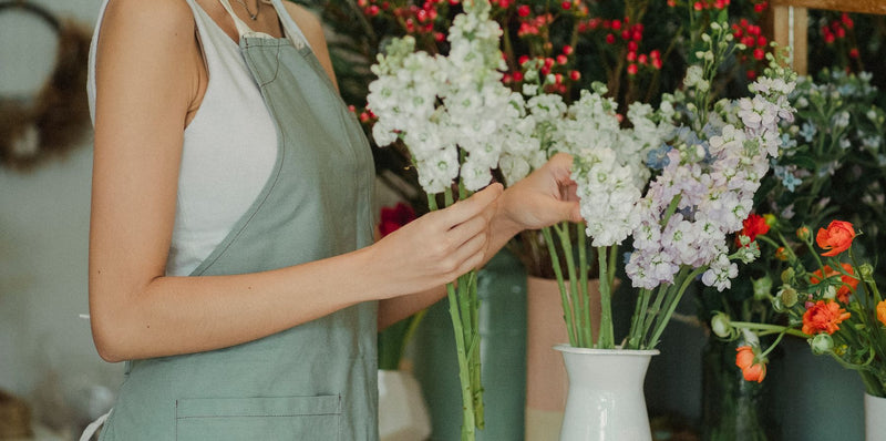 A florist selecting stems for an arrangement