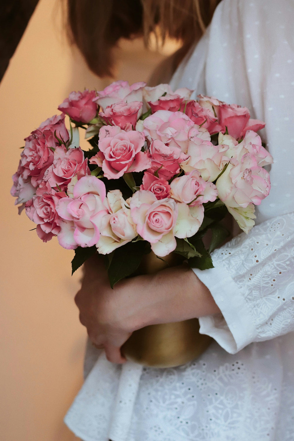 Pink and white rose bouquet; representative palette, final arrangement may vary.