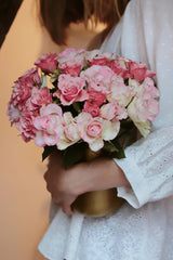 Pink and white rose bouquet; representative palette, final arrangement may vary.