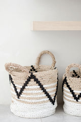 Woven decorative basket styled against a pale background; category reference, not the exact Sinan Black Stitch weave or selected dimension. Photo: EL The Explorer / Pexels.